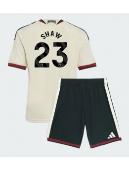 Otroški Nogometna dresi replika Manchester United Luke Shaw #23 Tretji 2026-27 Kratek rokav (+ hlače)